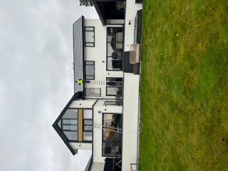 Large modern house full re-roof